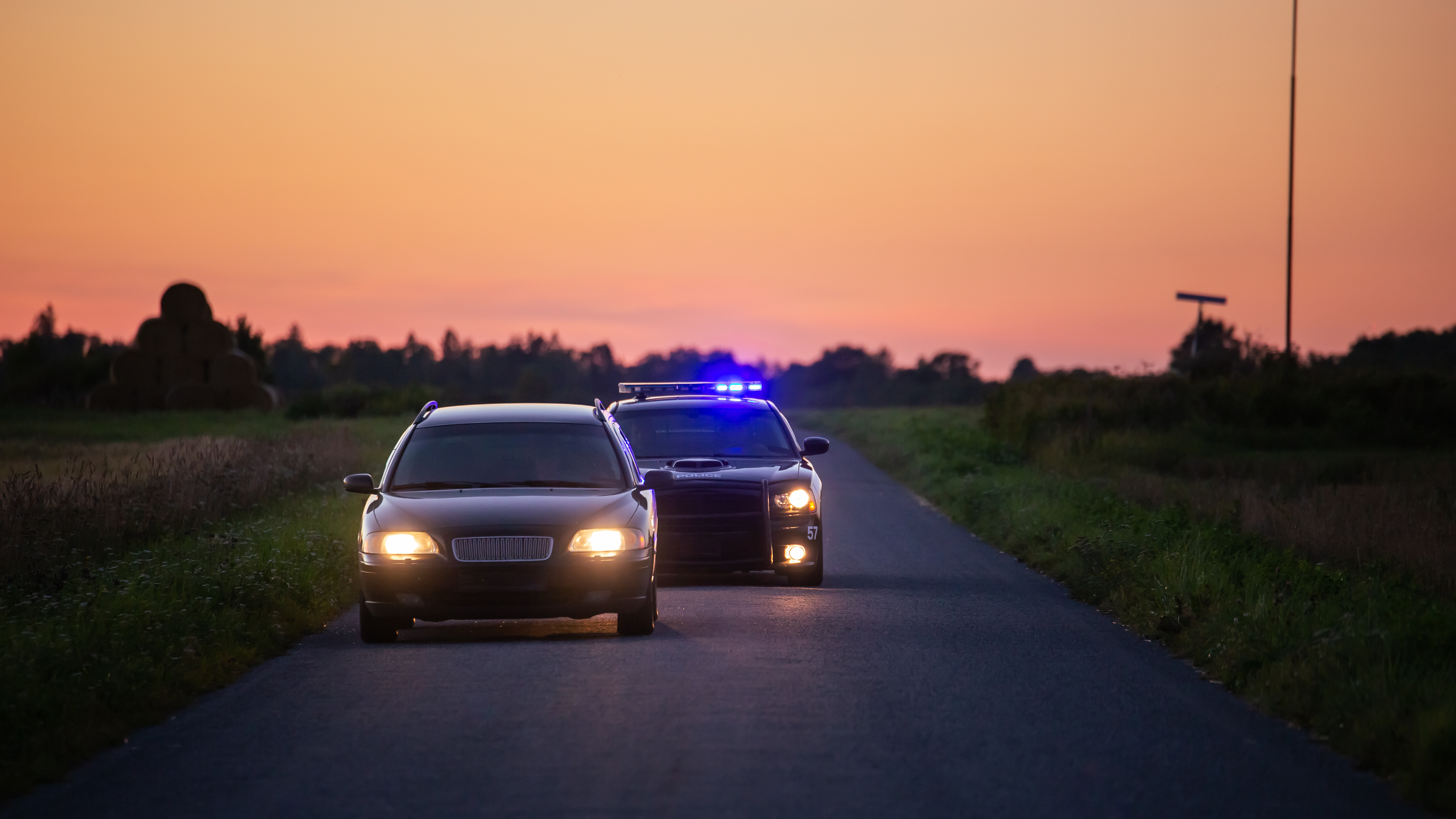 A drunk driver getting pulled over - contact Branson West Law today to work with an experienced DUI defense attorney in Utah.